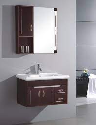 Kitchen cabinets and bathroom cabinets have subtle differences that make them more suited to the rooms in which they're installed. Contemporary Bathroom Vanities Made To Look Like Furniture Of An Antique Chest Small Bathroom Sinks Wall Mounted Bathroom Cabinets Wall Mounted Bathroom Sinks