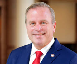 Democrat and GOP Challengers Target Justice Charles Spain in Election