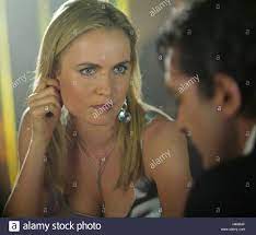 During the scene when antonio banderas is talking to radha mitchell at the russian night club at around 26 minutes the mark, there is a techno remix of the traditional russian folk song, korobeiniki. Thick As Thieves 2009 Radha Mitchell Mimi Leder Dir Moviestore Sammlung Ltd Stockfotografie Alamy