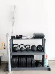 Here he walks through a diy set of a training barbell and plates. Diy Home Gym Weight Rack For 30 Jordan Jean