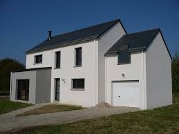 This feature is overshadowed, however, by the thick wooden panels on the building's façade, which are both striking. Photos De Maisons Neuves Couleur De L Enduit