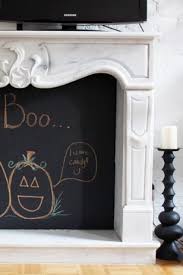 On the porch step rails or columns, cornstalks can be tied and decorated with wispy purple ribbons and cute owls. 45 Diy Halloween Decorations Cool Homemade Halloween Decor