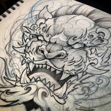 Black And Grey Foo Dog Hand Tattoo Halfsleevetattoos Irezumitattoos Japanesetattoos Tribaltattoos In 2020 Foo Dog Tattoo Foo Dog Tattoo Design Japanese Tattoo Art