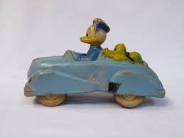 Vintage Sun Rubber Co Disney Donald Duck And Pluto In Blue Car Automobile Cars Vintage Toy Collectibles Www Pennsvintage E Vintage Toys Duck Toy Old Toys