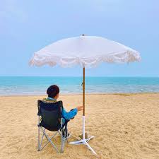 Sunfoo can not only help you select the best umbrella for your user, we can also. Ovida Outdoor Umbrella White Color Wood Paiting Custom Beach Umbrella With Tassels