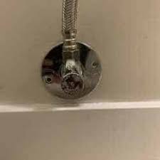 Closing the toilet's shutoff valve. How To Turn Off Water To Your Toilet Quickly Updated July 2021