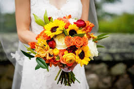 Other fall wedding flowers in season include gladioli, zinnias, and marigolds. 29 Fall Bridal Bouquets That Are Beautiful Beyond Words