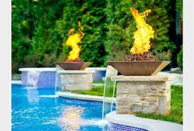 The fire's flames can add light to your pool area and create an interesting reflection in the water. Pool Fire Bowl Houzz