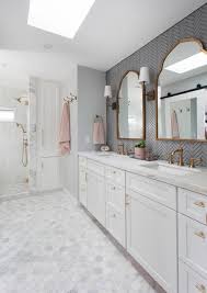 The color makes the room appear larger and brighter without adding too much lighting. Transitional Style Master Bathroom Best Home Style Inspiration