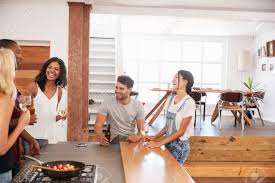 How long do the recipes take to cook and how much time do you have before the dinner party to prepare? Friends Prepare And Serve Food For Dinner Party At Home Together Stock Photo Picture And Royalty Free Image Image 86206746