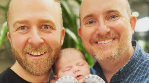Two dads recall amazing moment they met their daughter for 1st time