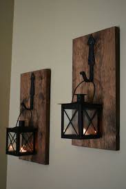 The original design of the farmhouses was perfectly fine in my view. Wall Candle Holder Lantern Sconce Hanging Lanterns Metal Etsy Rustic Wall Sconces Wall Candle Holders Rustic Wall Decor