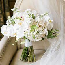 Classic white rose and orchid bouquet. 30 Orchid Bouquet Ideas For Brides And Bridesmaids