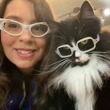 Truffles The Cat Helps Kids Feel Comfortable With Fearing Glasses When They  Go To Optometrist