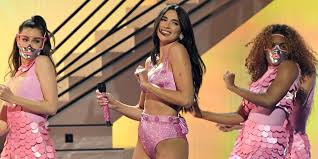 The song was written by lipa, clarence coffee jr., sarah hudson and stephen kozmeniuk, with the image of mike myers in austin powers in mind. Watch Dua Lipa Perform Don T Start Now Levitating With Dababy At Grammys 2021 Pitchfork