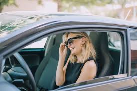Download Blonde Young Woman Sitting In The Car Laughing For Free Women Free Photos Blonde