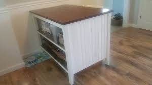 Create the waterfall kitchen island using ikea butcher blocks and use an ikea expedit bookshelf for the mini island. Salt Marsh Cottage Ikea Kitchen Island Hack