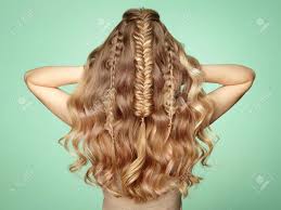 By parting your hair on one side. Blonde Girl With Long And Shiny Curly Hair Beautiful Model Woman With Curly Hairstyle Care And Beauty Hair Products Lady With Braided Hair Stock Photo Picture And Royalty Free Image Image 112453795