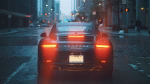 Download Wallpaper Porsche 911 Carrera On Rainy Streets 2560x1440 Get us on google play store.