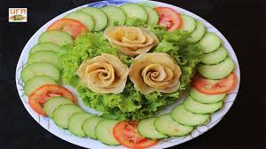 Smooth top of potato salad, preparing for decoration. Potato Flowers With Salad Cucumber And Tomato Decoration Arts Youtube