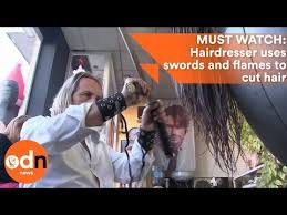 Alberto olmedo, uno de los artistas más famosos, exitosos y queridos del país falleció el 5 de marzo de 1988 al desde el balcón de su departamento en el piso 11 del edificio maral 39 de mar del plata. Bizarre Hairdresser Uses Swords And Flames To Cut Hair