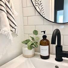 Black And White Bathroom Soap Dispenser Bathroom Makeover With White Subway Tile Black Faucet And Amber Soap Bottle Free Shipping On Our Glass Soap Glass Soap Dispenser Vintage Bottles Amber Glass