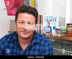 Jamie oliver poses in a kitchen in london hi-res stock photography and  images