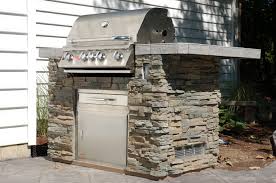 Receive a free smoker box, grill head cover, rotisserie kit, griddle and griddle remover; Denver Outdoor Kitchens Equipment Installations