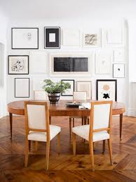 The rounded edges of the dining chairs, table, pendant, and planter work together to soften the angular shape of the windows and room itself. The Best Dining Room Chairs York Avenue