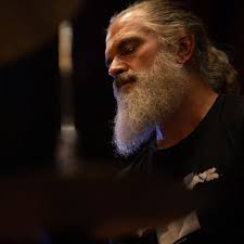 how can drummers get more visibility in live performance shots?