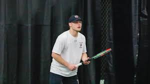 Eagles fall to Green Knights, take down Cougars