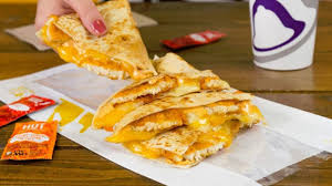 I guess the most surprising part is they cut the quesadilla inside the wrapper. Taco Bell Debuts New Crispy Chicken Quesadilla Made With Naked Chicken Chips Chew Boom