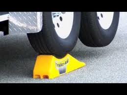 Examine the ramps to see what protection they this car ramp is meant to help cradle your trailer tire but can be used to lift any vehicle that weighs up to 15,000 pounds. Easy Trailer Tire Change Without Unloading Trailer Aid And Trailer Aid Plus Youtube