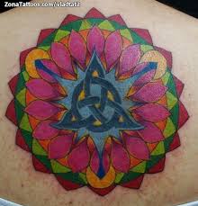 Tattoo Of Mandalas Triquetra It's basically a triquetra, encircled, with flowers of the lacy phacelia plant wrapped around it. tattoo of mandalas triquetra