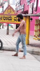Indian Videos: Desi man walking half nude on… ThisVid.com