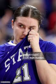 Nevaeh Dean of the UC Irvine Anteaters eyes the basket as Brynna... News  Photo