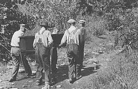 Mountain People Carrying A Homemade Coffin Up Creek Bed To The Family Plot On The Hillside Where It Will Be Buried This Appalachian People Appalachia History