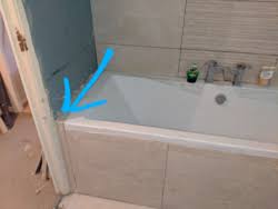 Do this in addition to silicone sealing the space between the bath and the wall, and you should have a seal that prevents both. Advice For Tiling Around End Of Bath Panel Tilersforums Com Tiling Advice Forum