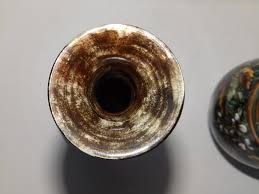 Sold at Auction: A pair of Doulton Lambeth 'faience' vases by Walter Gandy,  decorated overall floqwering foliage