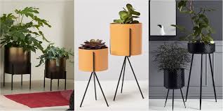 There's nothing a gloriously large plant can't fix when it comes to adding a dash of nature to your home and garden. Best Indoor Plant Pot Stands Plant Stands Planter On Legs