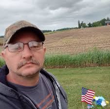 How to remove the hood from a GC1705 snowblower?