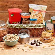 Browse for gourmet gift baskets in categories including popcorn, chocolate, fruit & nut, deli & more. Items To Put In Food Baskets For The Needy Thanksgiving Food Basket Food Basket Christmas Food Hampers