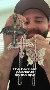 Cross Pendant with Wings