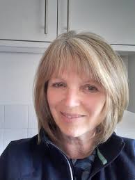 I'm 64 and have restyled from the longer image to this layered Bob. What  are your thoughts ? Should I grow it out again ?