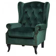 While dark shades of green such as emerald can become a touch overwhelming, gorgeous lighting and matching decor can create a sense of opulence. Emerald Green Button Pressed Wing Chair Living Room From Breeze Furniture Uk