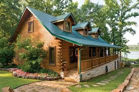 Farmhouse floor plans (or farmhouse style house plans) may feature a porch with simple round or square columns extending to the porch floor, with a balustrade between the columns. Custom Crafted Lakefront Log Home