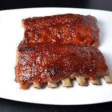 Bones Sticking Out Of Bbq Ribs Cooked In The Oven At 350 Degrees Ribs Recipe Oven Rib Recipes Baked Ribs