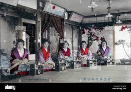 1910s Japan - Japanese Prostitutes in Tokyo's Yoshiwara Red Light District  ] — Prostitutes in the Yukaku (red light district) of Yoshiwara in Tokyo.  20th century vintage postcard Stock Photo - Alamy