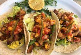 Your family will love this kind of fish taco is either grilled or fried and topped with either a creamy or vinegar based slaw. Fish Tacos With Roasted Chiles Guacamole And Oven Dried Tomato Mango Salsa Picture Of Big Fish Calgary Tripadvisor