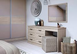 Our dressing table buying guide will help you plan and measure your room and pick the right style, colour, format and drawer size for your new styling station. Matching Fitted Bedroom Furniture Built In Dressing Tables Chest Of Drawers Uk Hammonds